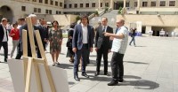 მიხეილ ჯანელიძემ ფოტოგამოფენა „ომი ჩვენს ობიექტივში“ დაათვალიერა